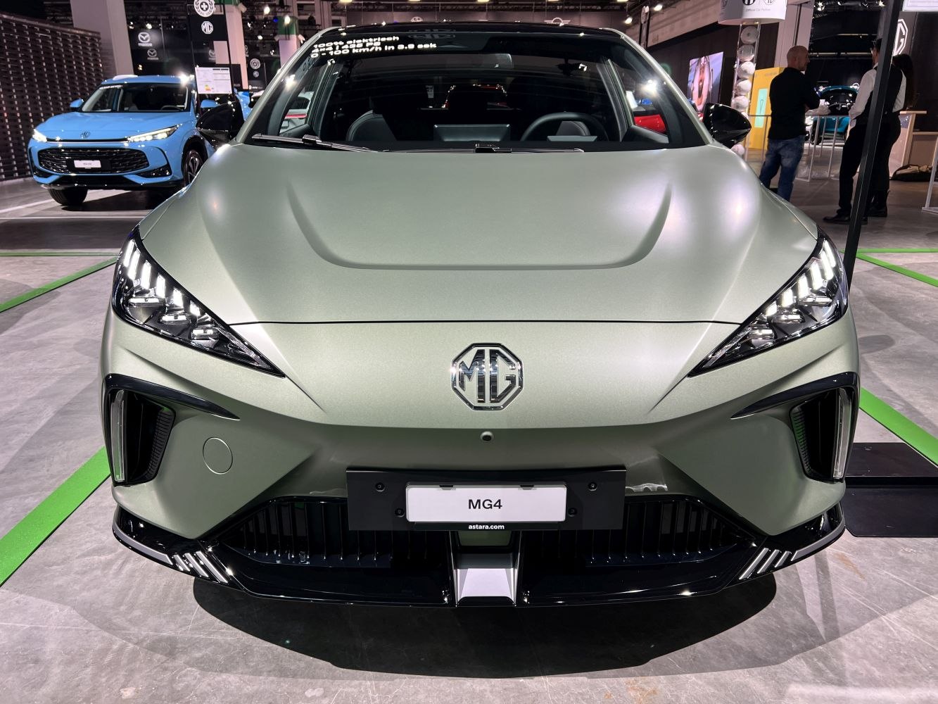 Front view with sharp LED headlights and aerodynamic hood