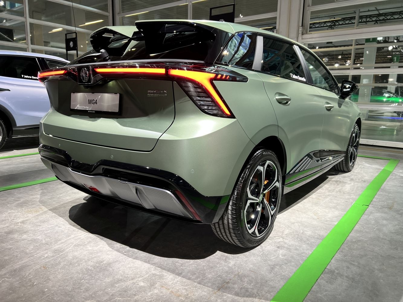 Rear view of electric hatchback with LED taillights and alloy wheels