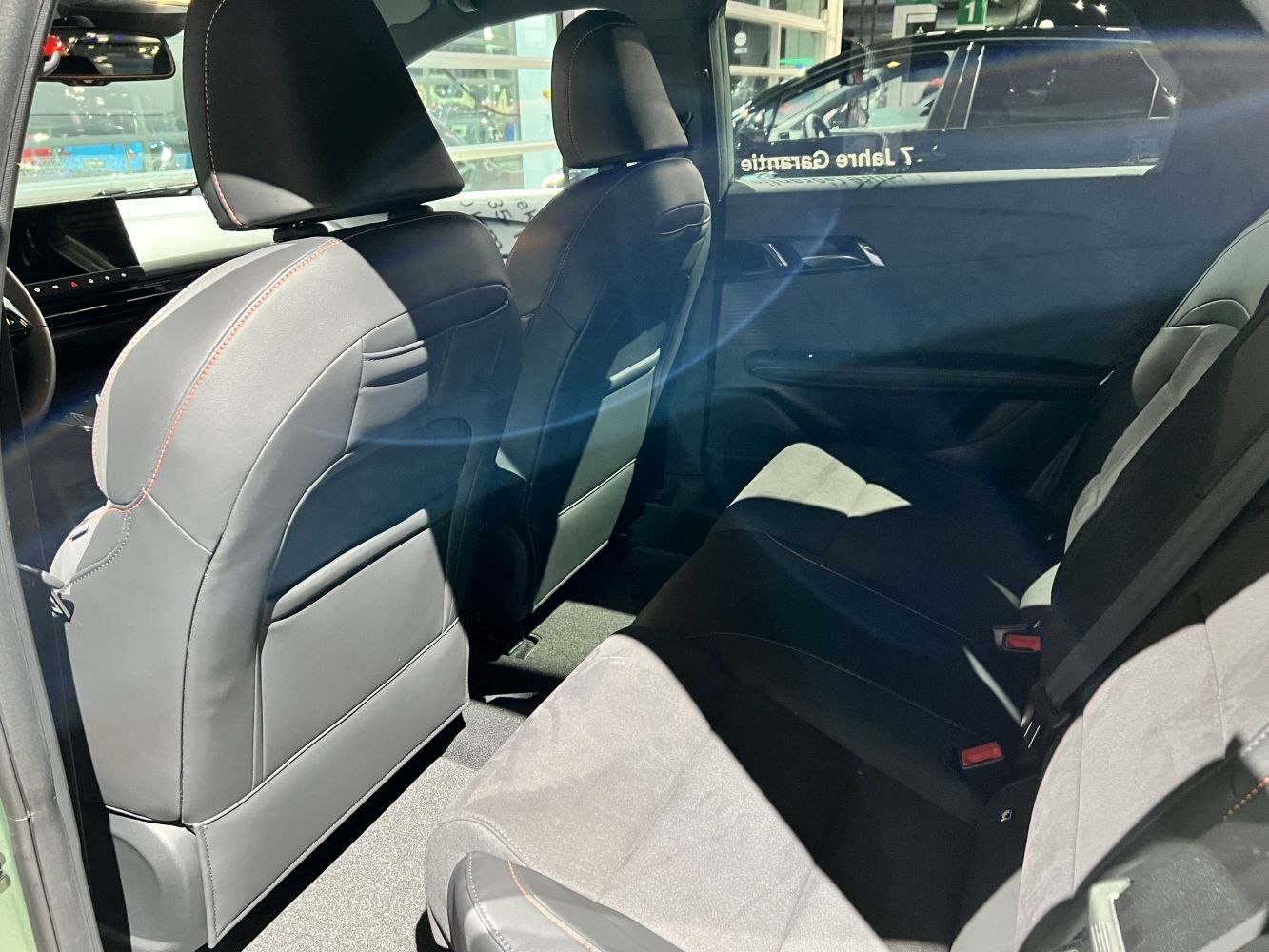 Rear interior seating and upholstery with modern design and comfortable space