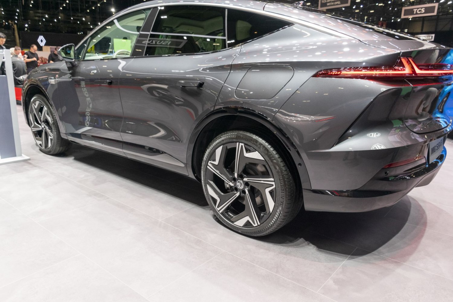 Rear side profile with sleek lines and distinctive alloy wheels