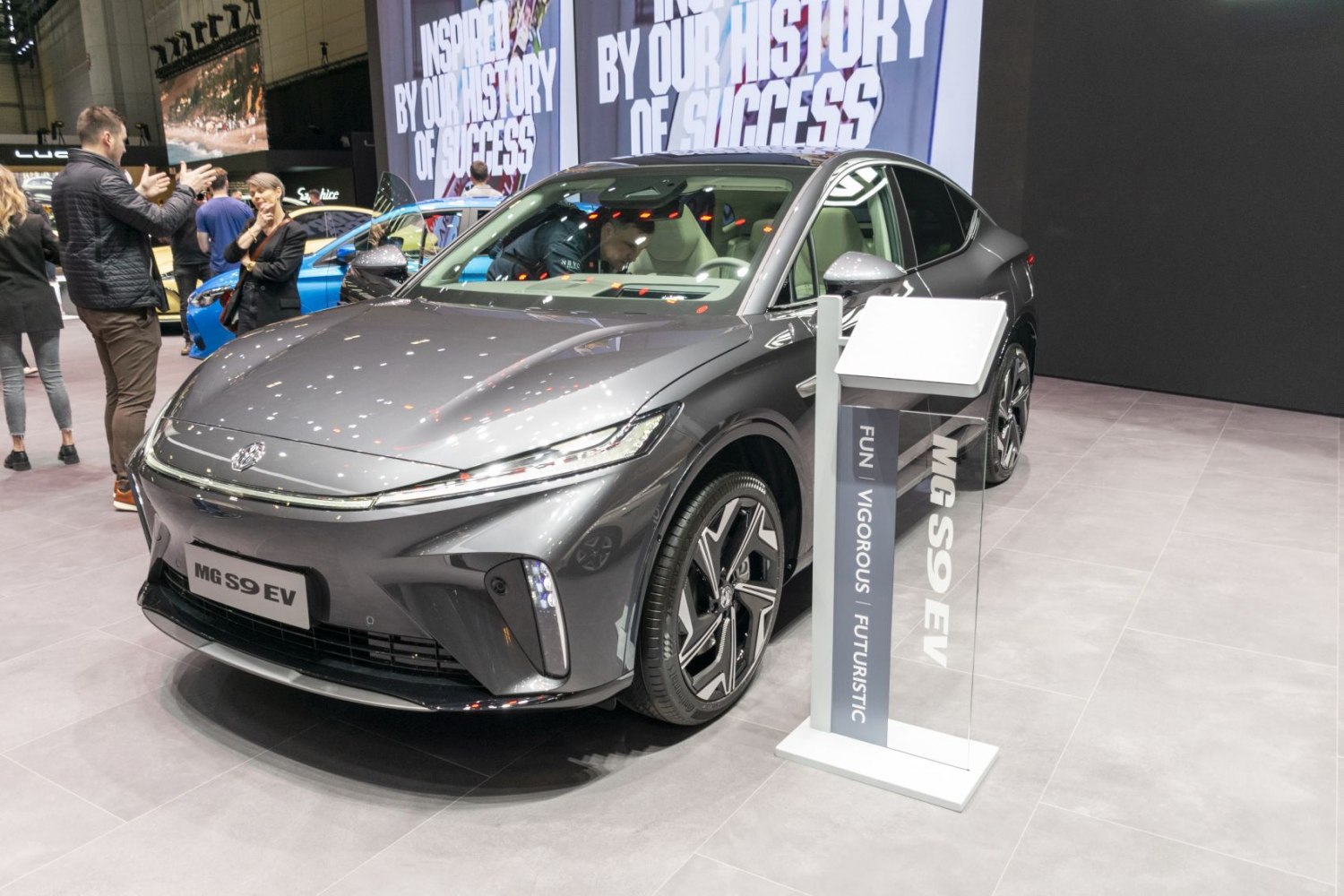 Sleek front side view with LED headlights and alloy wheels