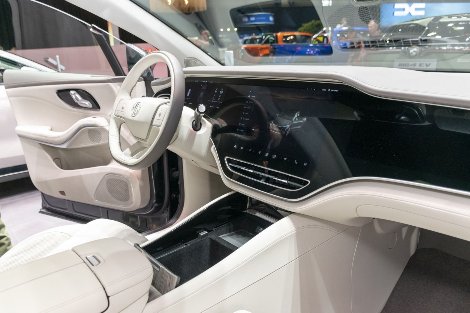 Futuristic dashboard and steering wheel with touchscreen interface