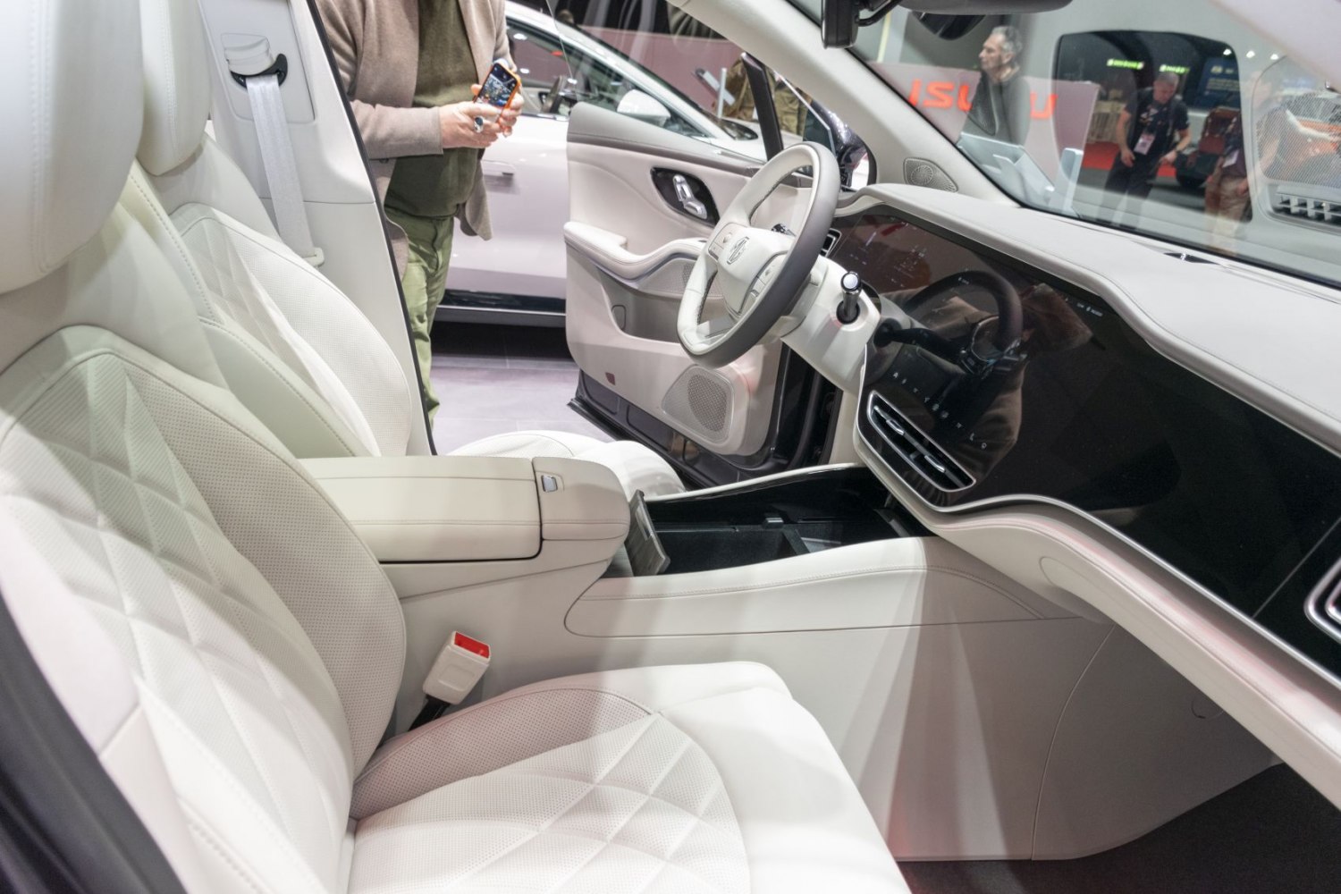 White quilted leather seats and wide digital dashboard with touchscreen