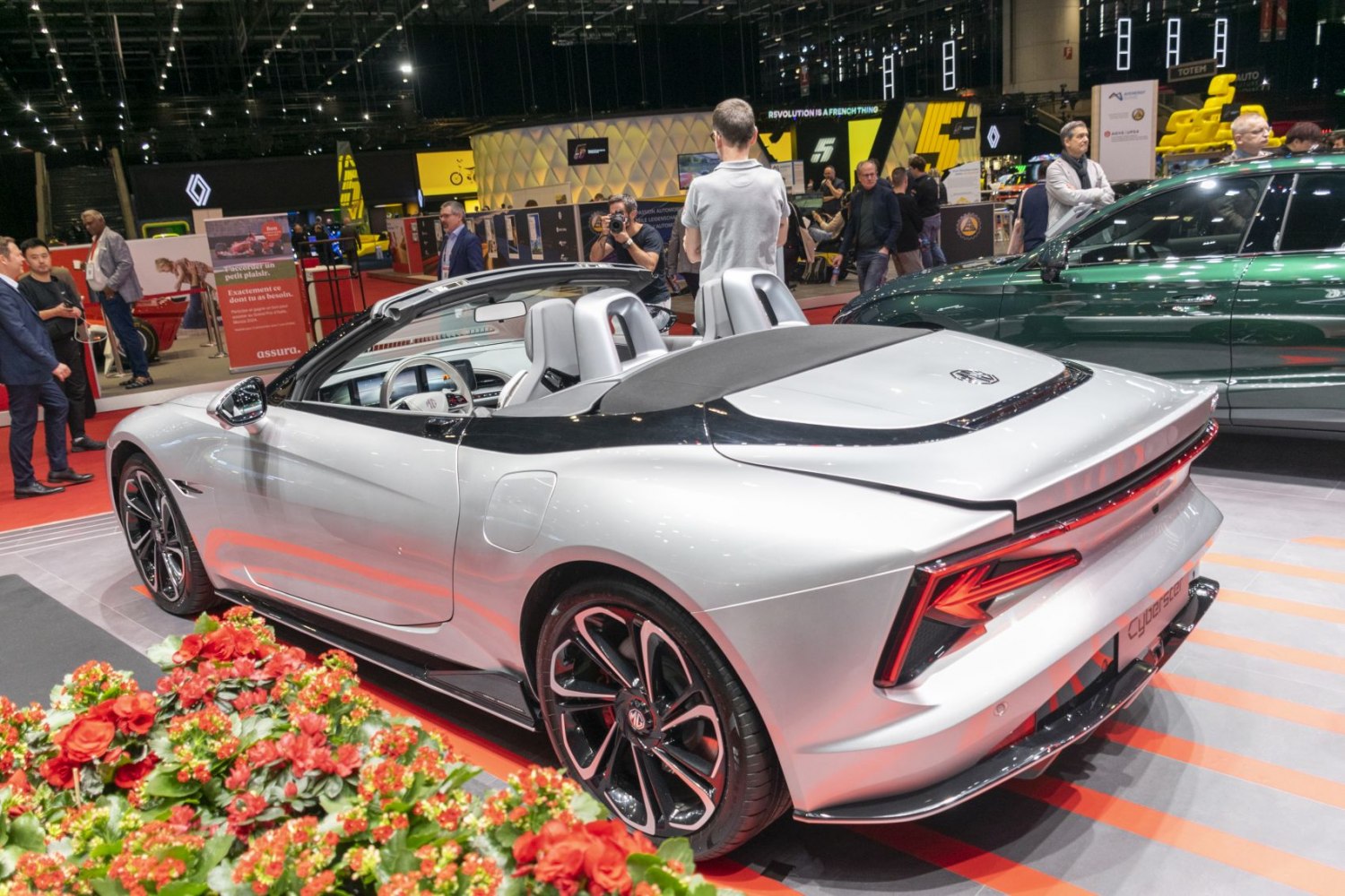 Rear view of sleek electric roadster with alloy wheels and sporty design