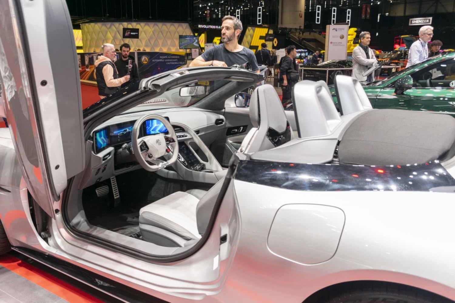 Convertible car interior with digital dashboard and modern white seats