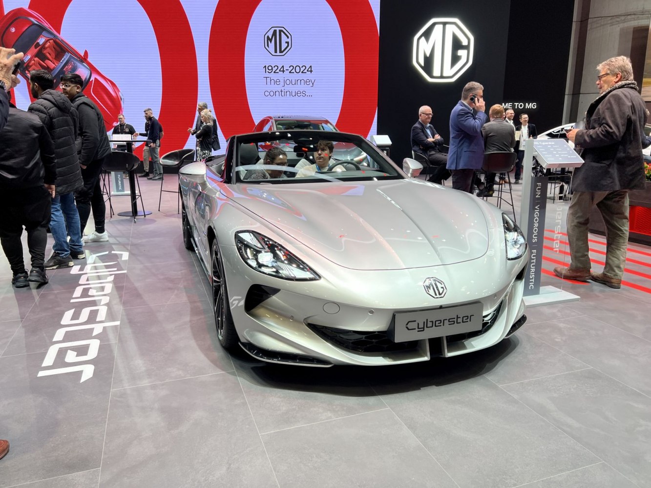 Convertible sports car front view with sharp headlights and aerodynamic body