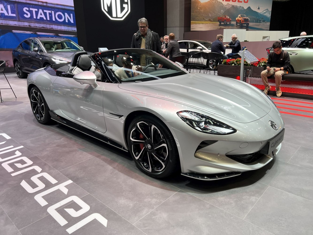 Convertible sports car with sleek aerodynamic design.