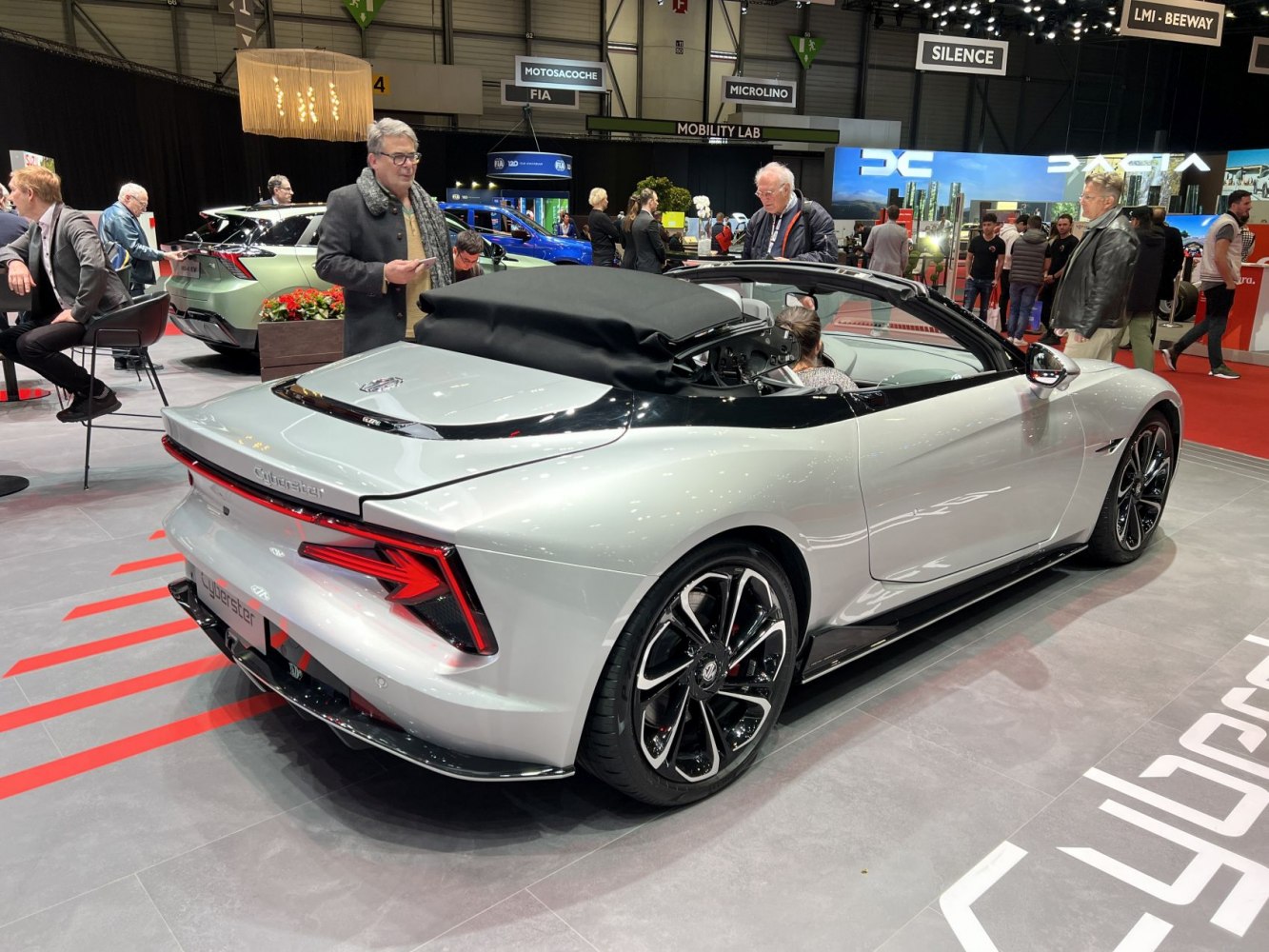 Electric convertible roadster rear view with LED taillights and alloy wheels