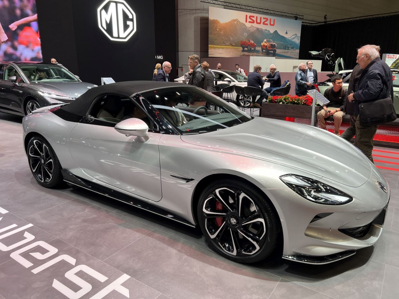Sleek convertible electric roadster with dynamic aerodynamic styling and modern alloy wheels.