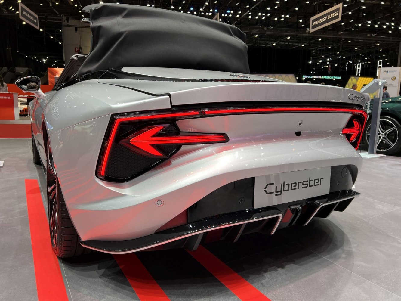 Rear LED taillights and aerodynamic diffuser close-up on a sporty convertible roadster