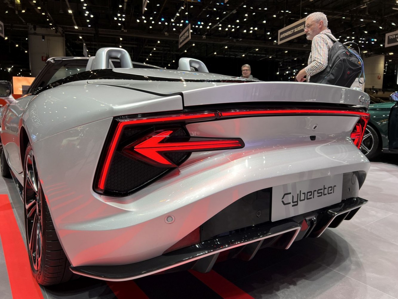 Rear LED taillights and diffuser design of a sporty convertible.