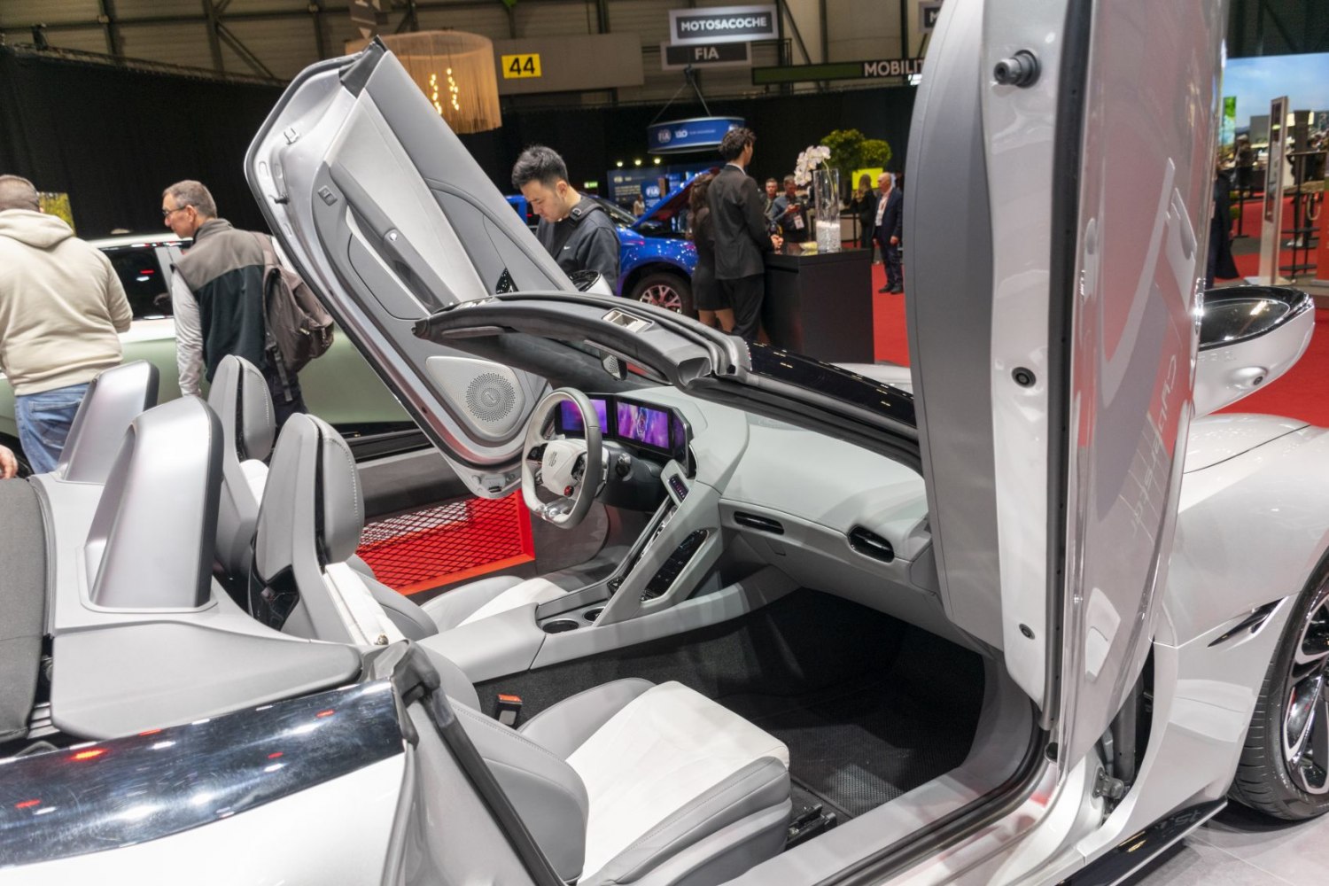 Futuristic car interior with butterfly doors open upwards