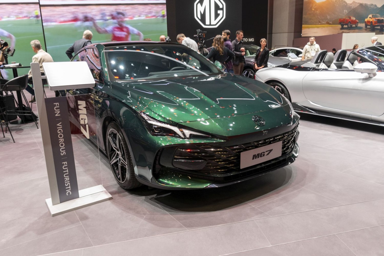 Front grille and sharp LED headlights of a modern sporty sedan