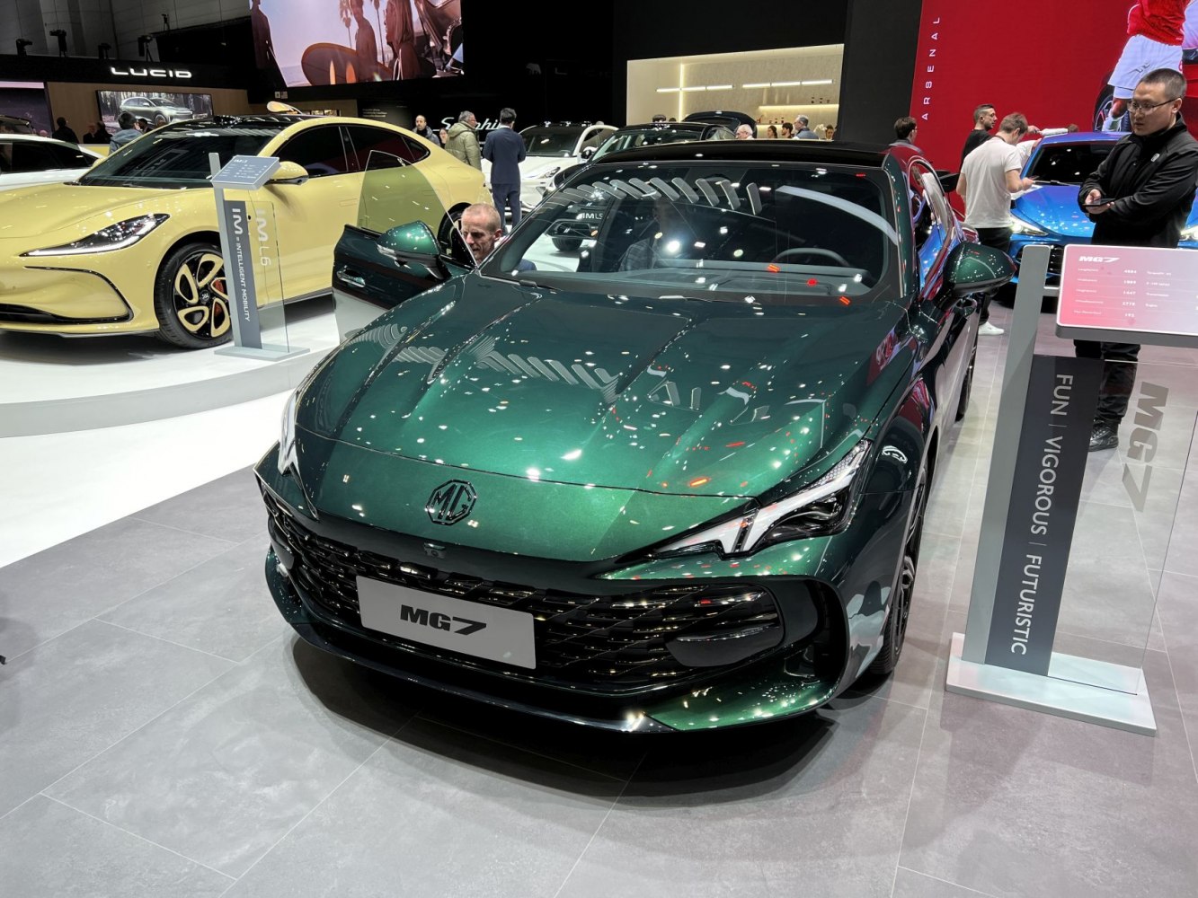 Aggressive front grille and sharp LED headlights of a modern sedan.