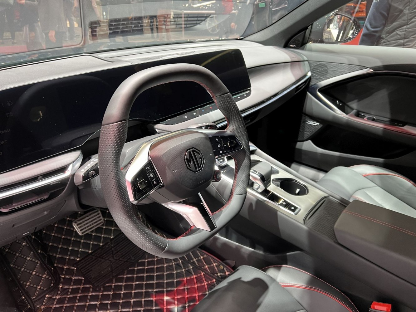 Modern steering wheel and digital dashboard with premium interior details