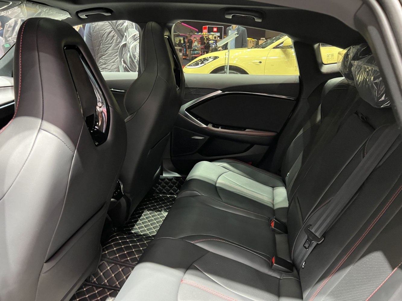 Modern leather rear seats with ergonomic design and spacious cabin