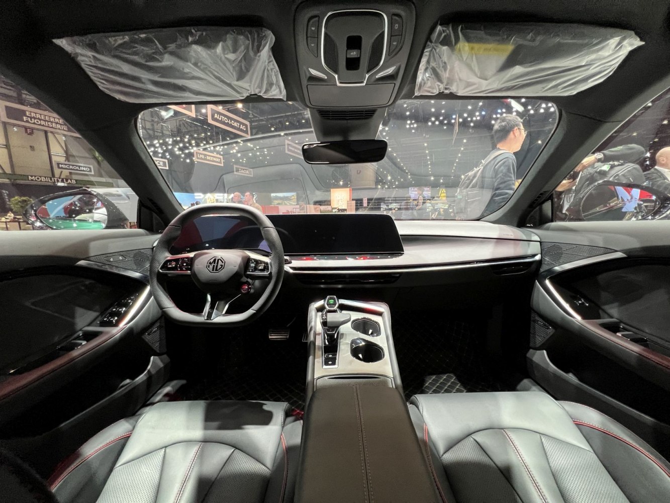 Digital dashboard and ergonomic steering wheel inside car interior