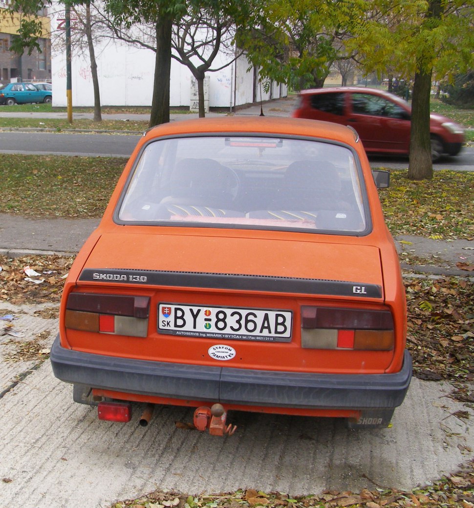 Vintage compact hatchback rear with tow hitch and tail lights