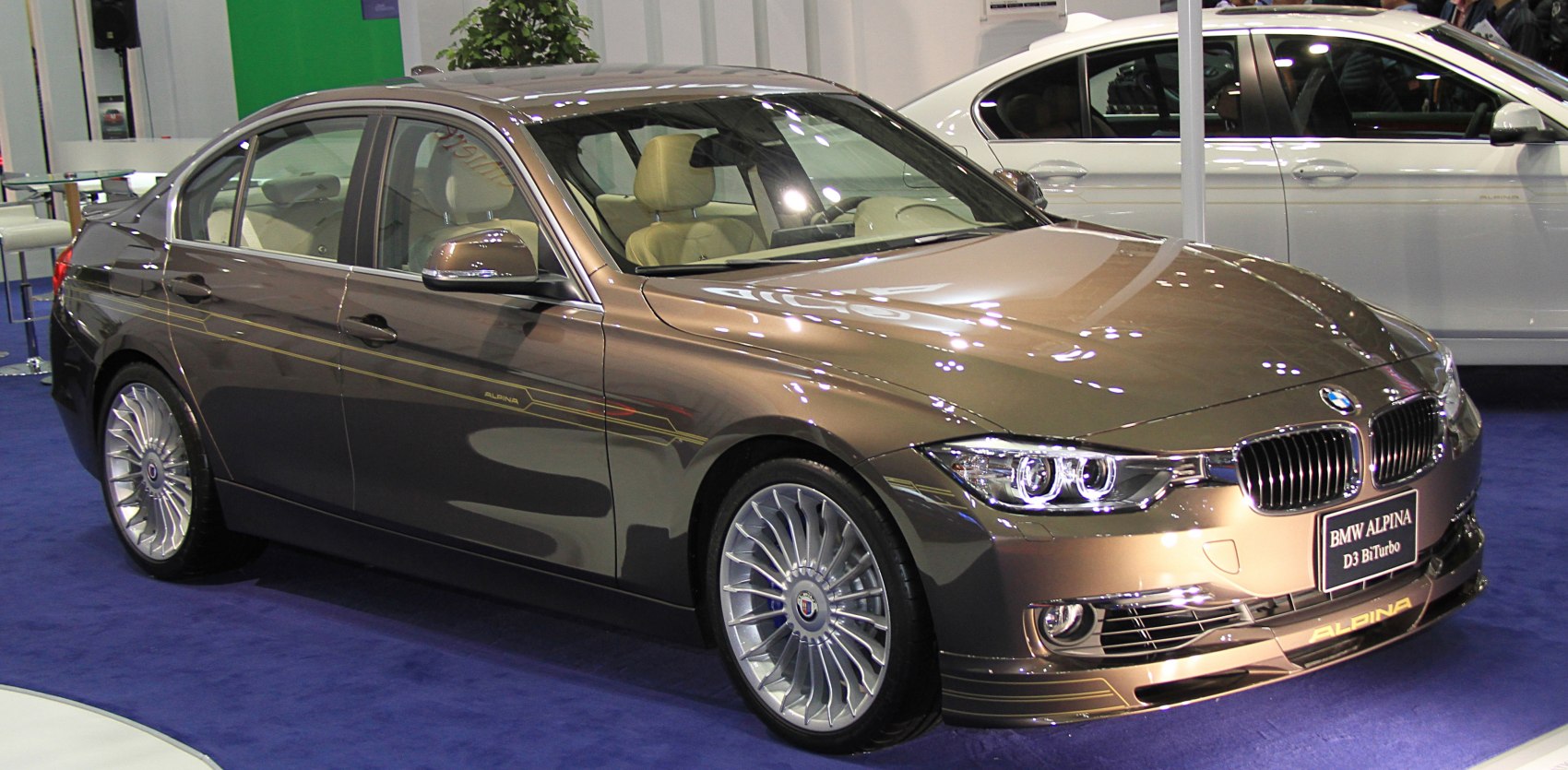 Luxury sedan with Alpina alloy wheels and distinctive front design