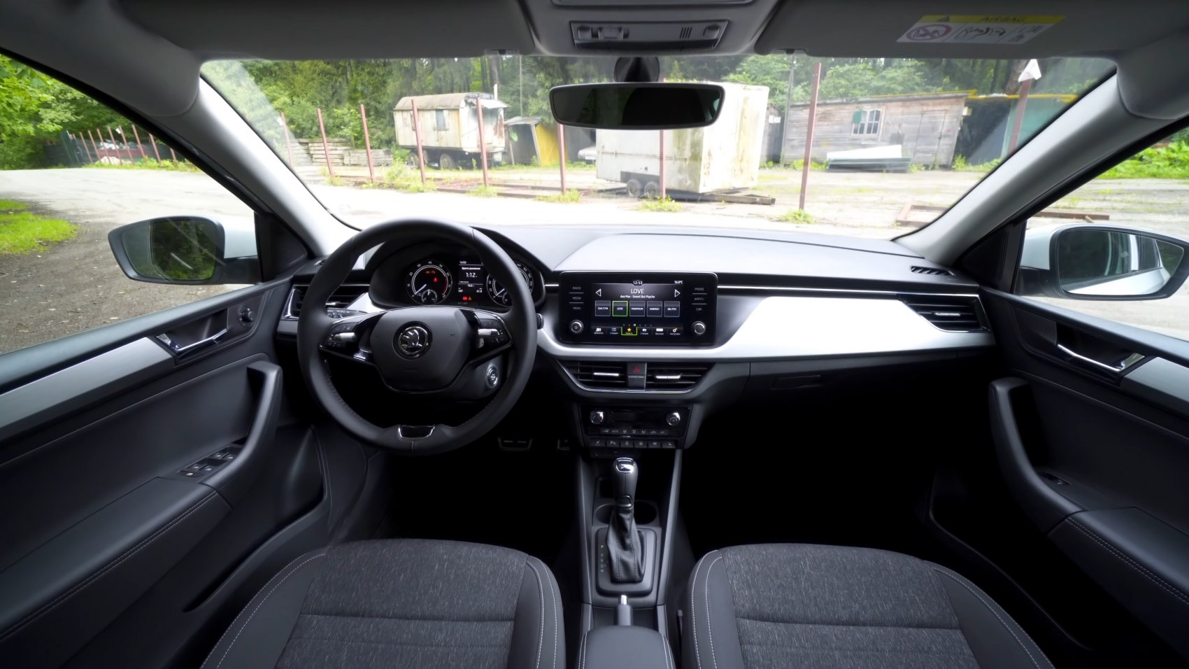 Digital instrument cluster and central touchscreen dashboard
