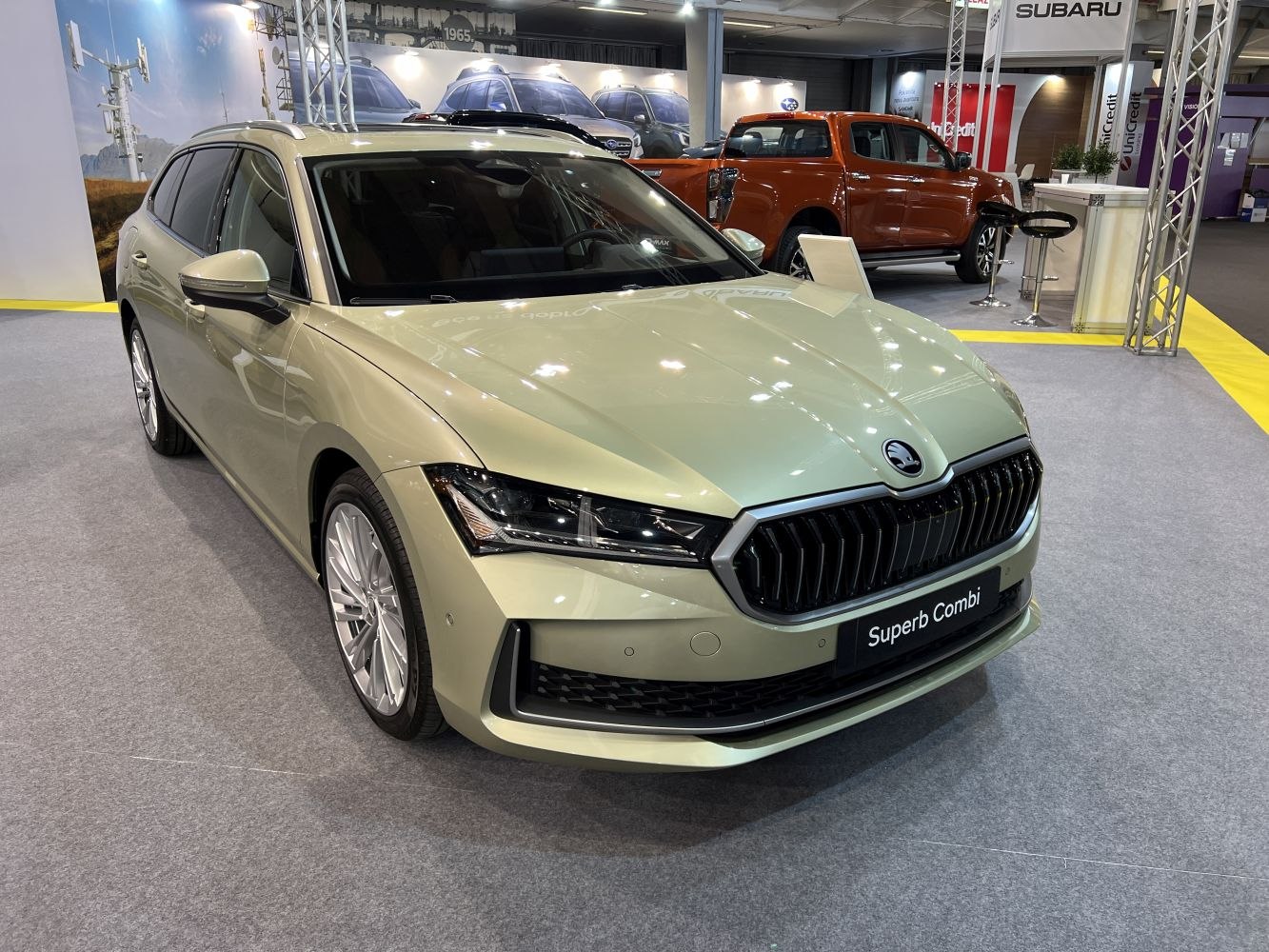 Front view with LED headlights and signature grille