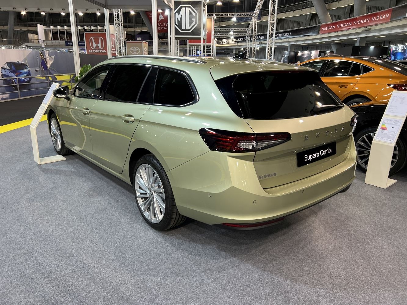 Rear and side view of a modern station wagon with alloy wheels and tinted windows.