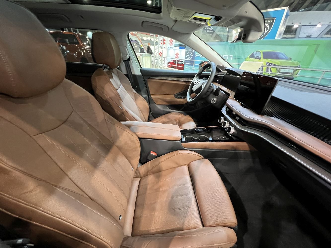 Brown leather seats and advanced modern dashboard interior