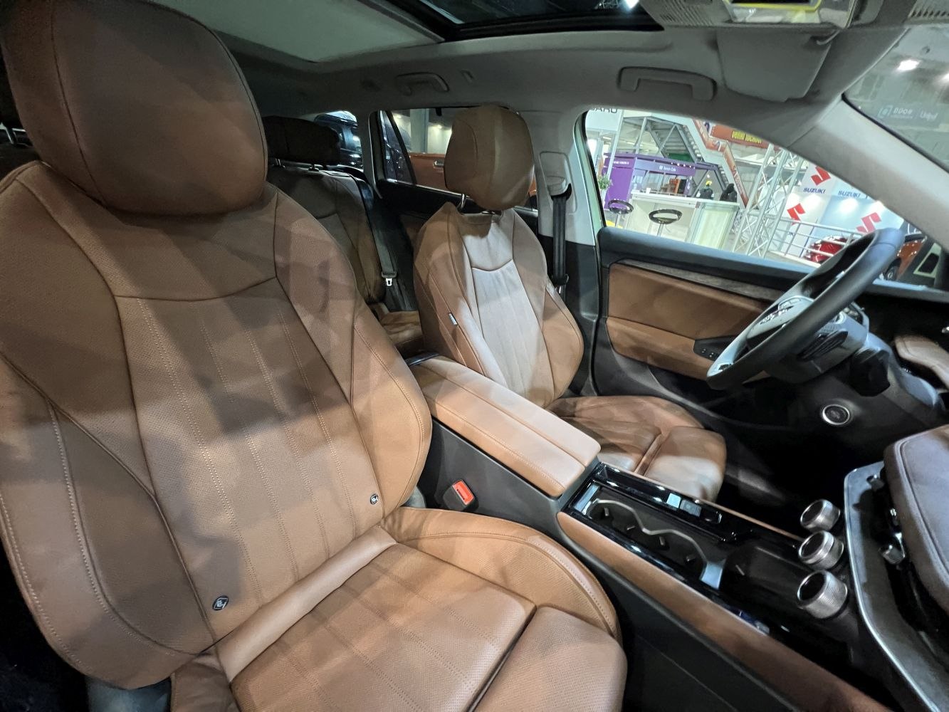 Luxurious brown leather seats and modern car interior design