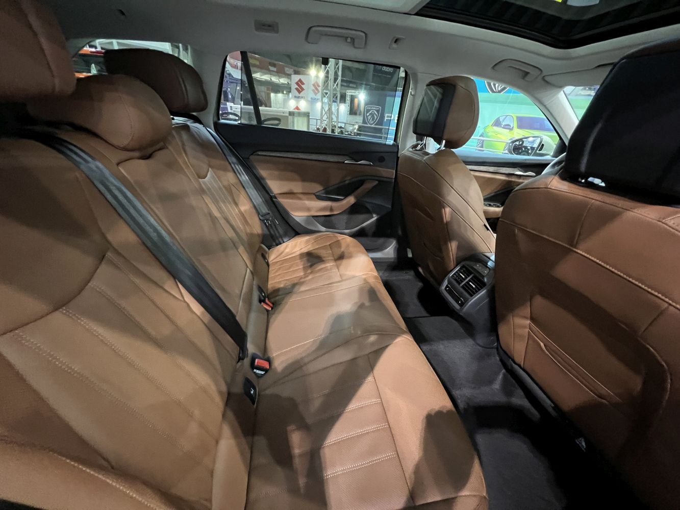 Brown leather rear seating with spacious modern interior