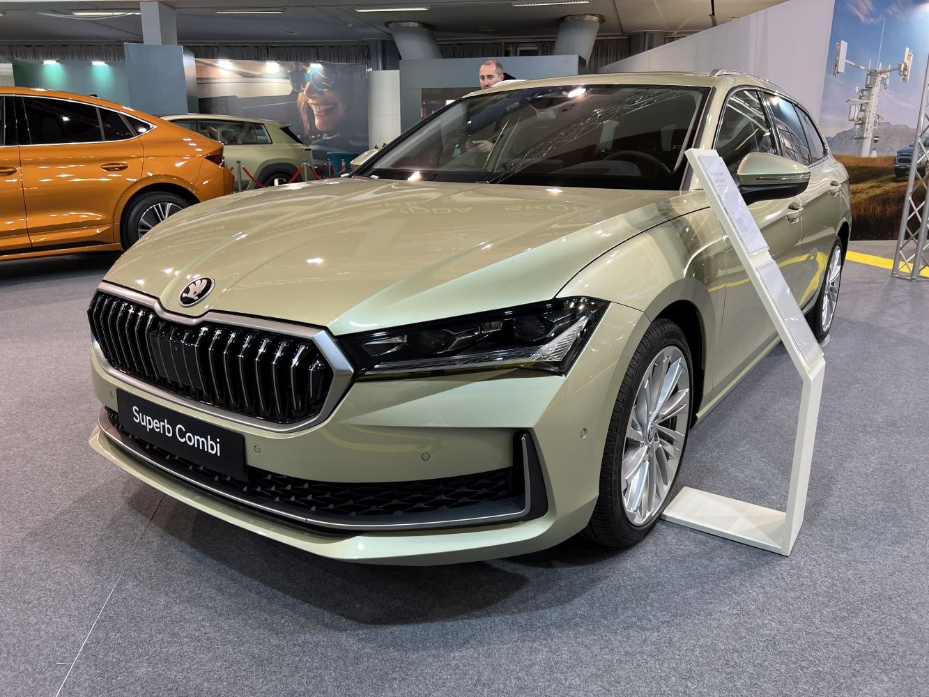 Front view of modern sedan with black grille and angular headlights