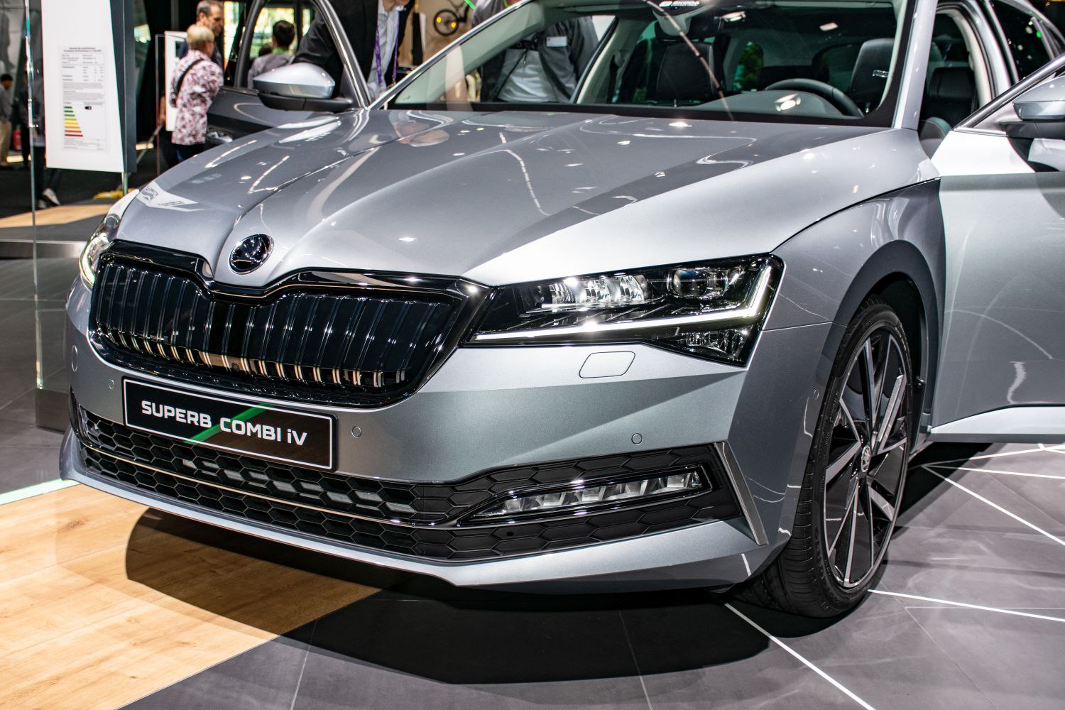 Close-up of front grille and LED headlights with alloy wheels
