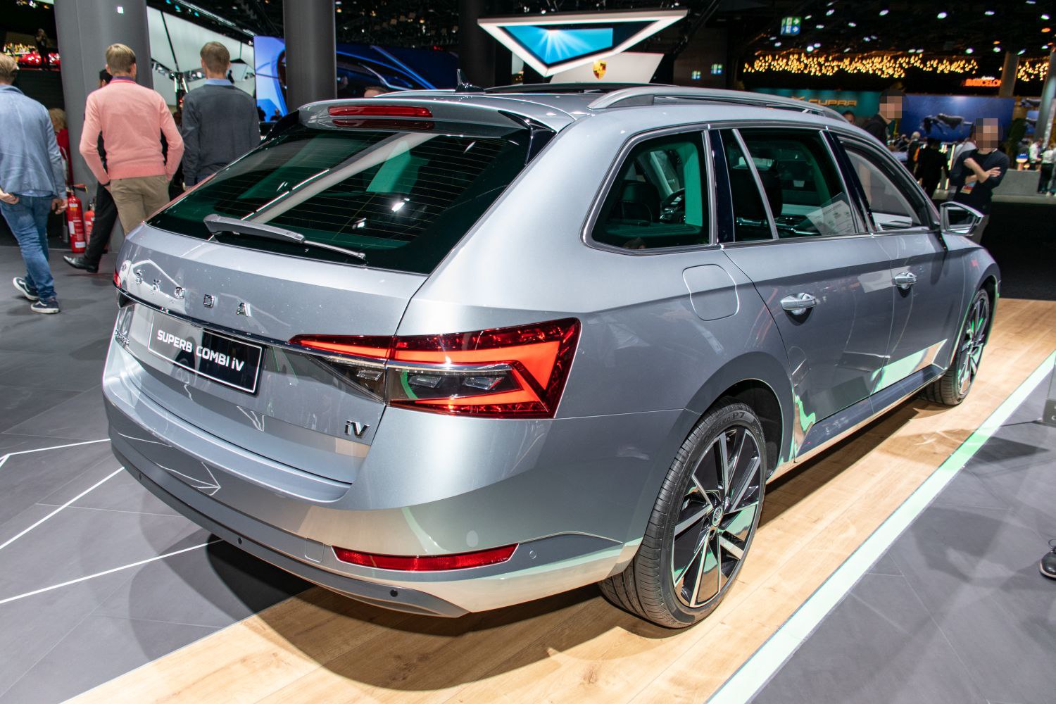 Rear and side view of a modern estate car with sharp tail lights and alloy wheels