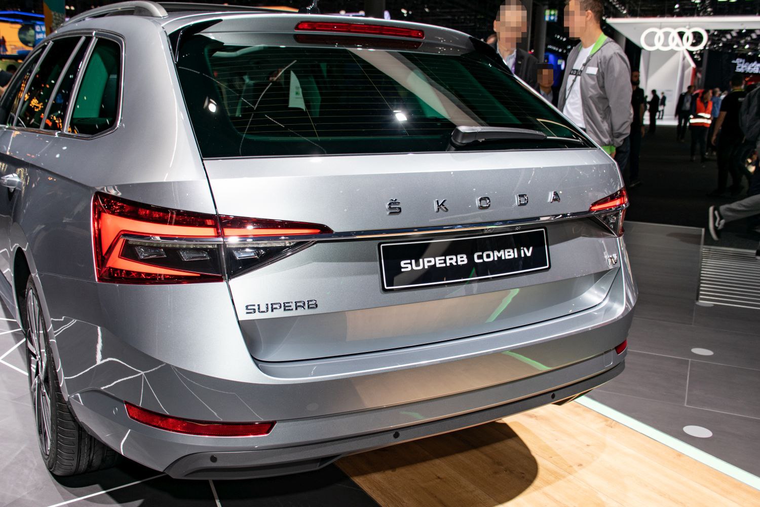 Rear exterior view with distinctive tail lights and silver paint