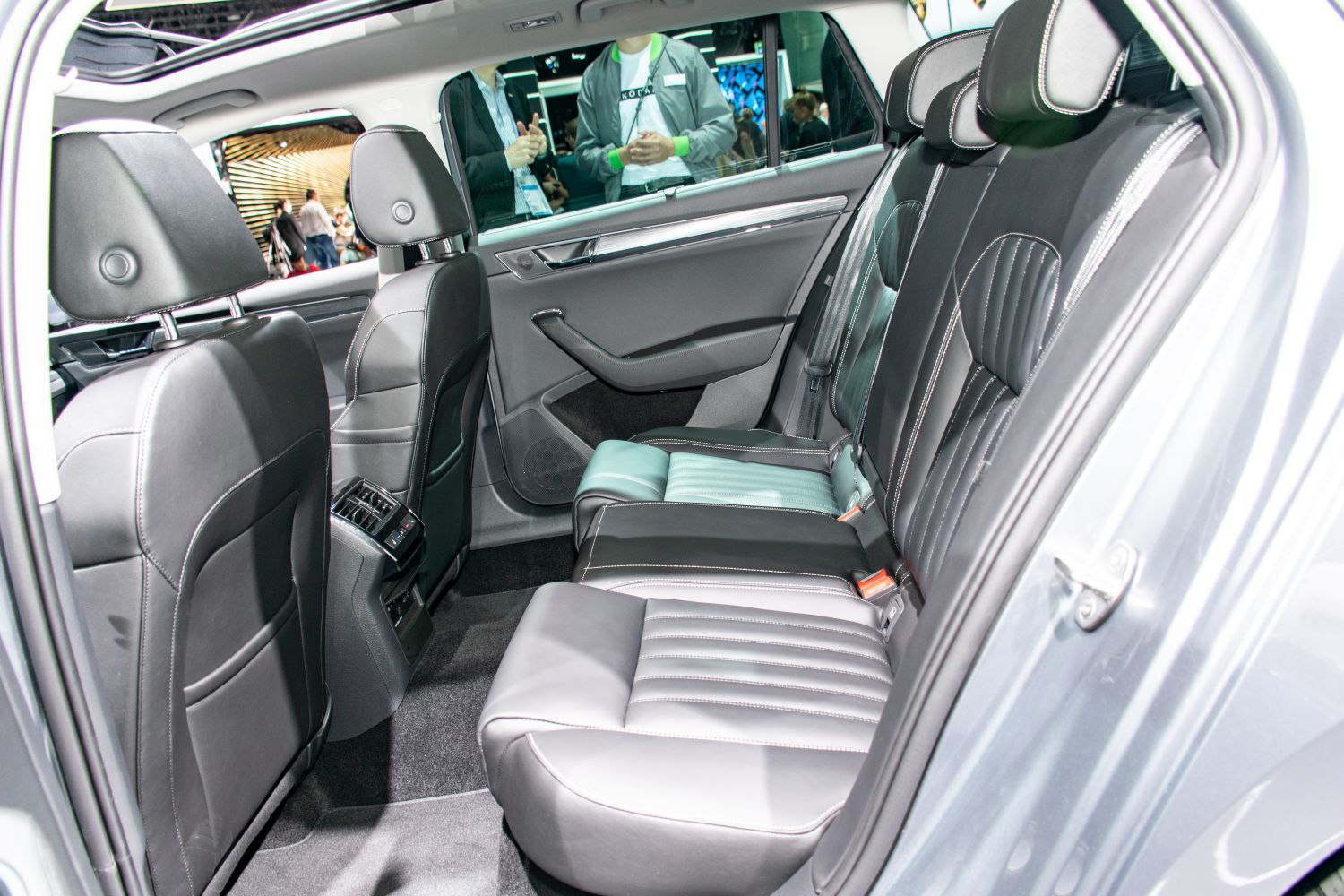 Spacious rear seating with black leather and rear air vents