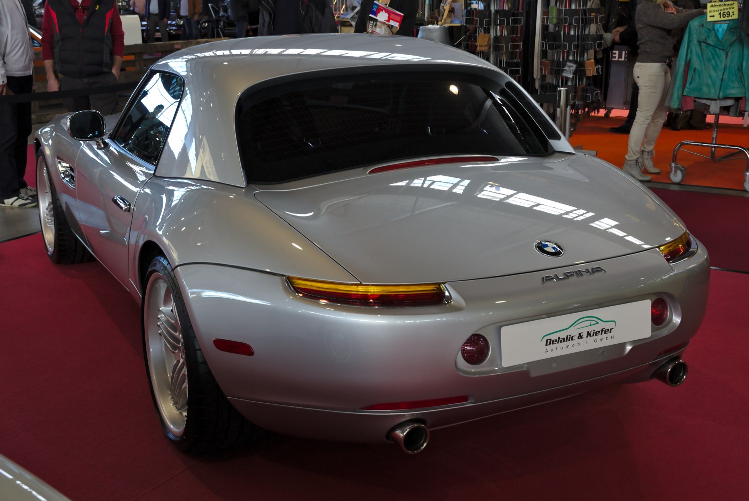 Sleek rear design with distinctive tail lights and dual exhaust pipes