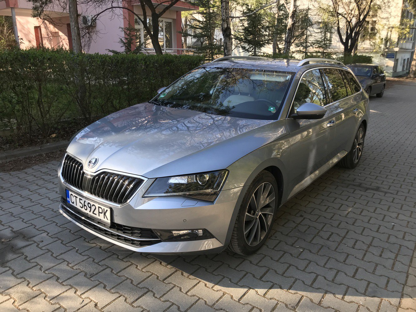 Silver estate with chrome grille and angular headlights