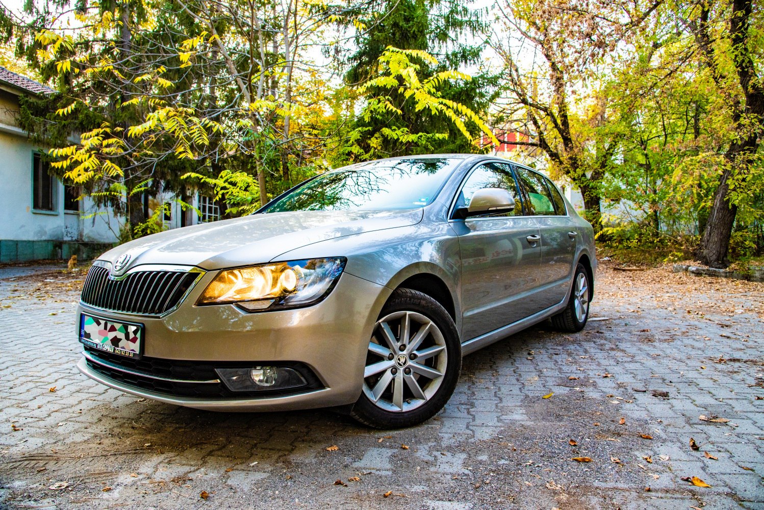 Front and side view with headlights and alloy wheels