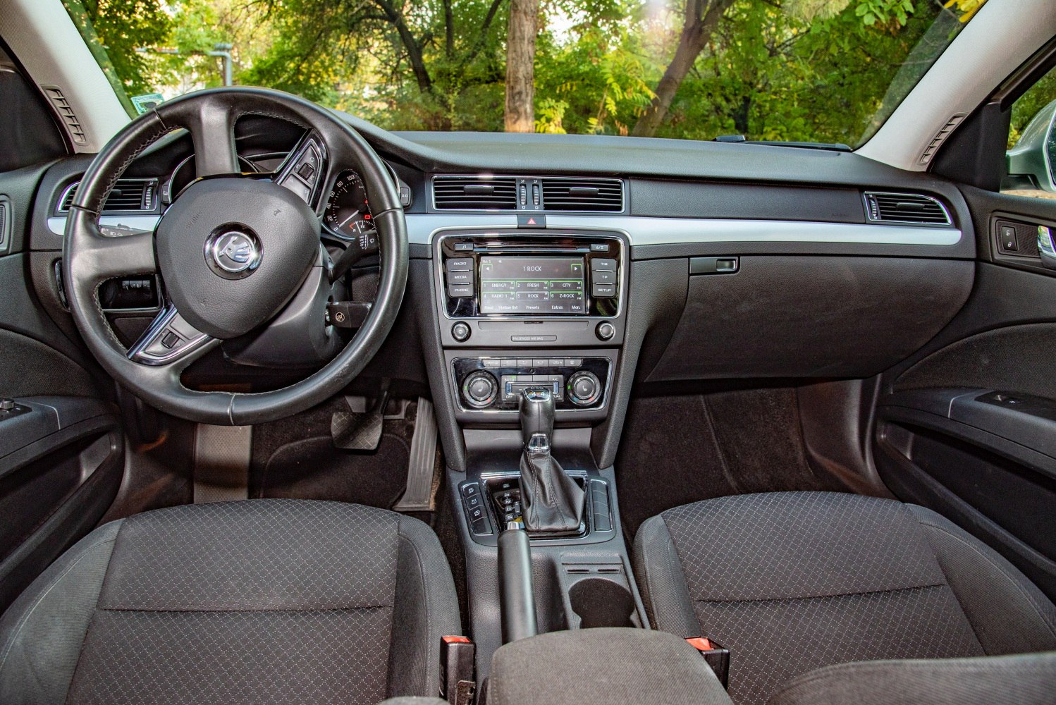 Dashboard, steering wheel, center console of a car interior