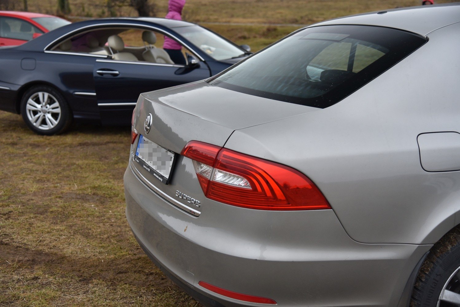 Close-up of rear taillight and trunk design with clear taillight pattern and smooth body lines.