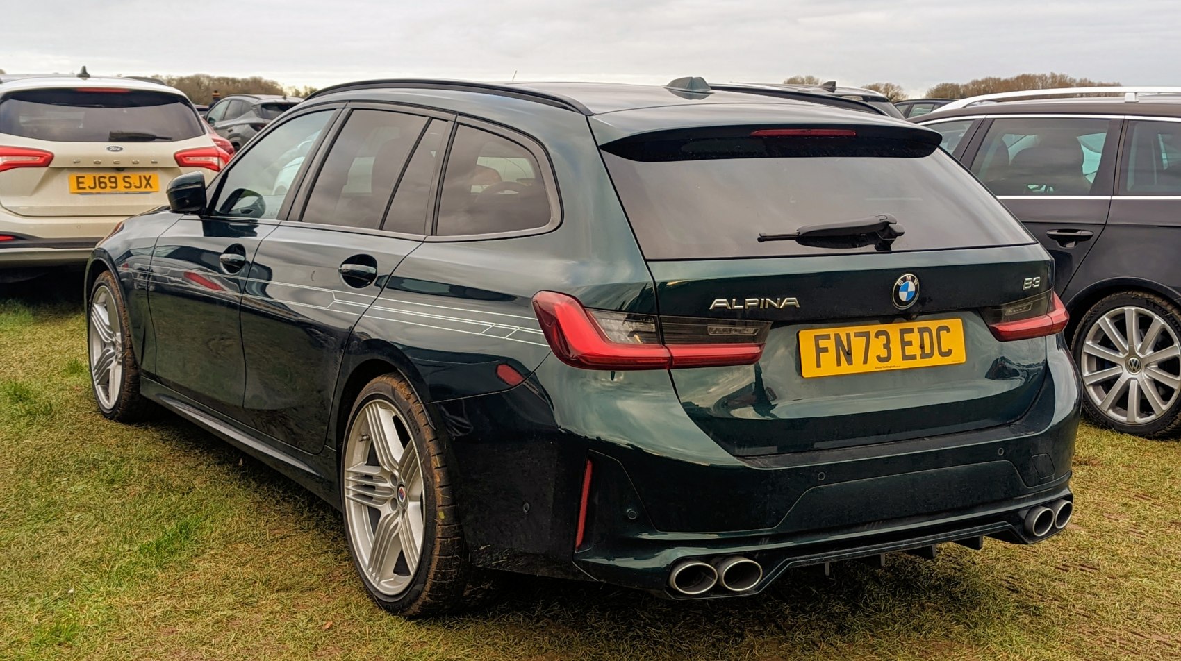 Rear and side profile with quad exhaust and Alpina alloy wheels