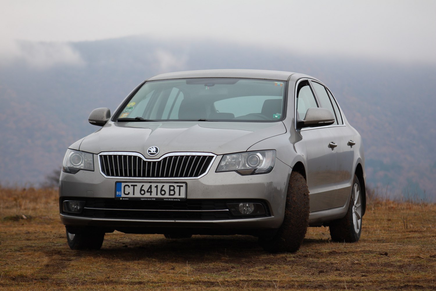 Front view of a mid-size sedan with distinctive grille and headlights