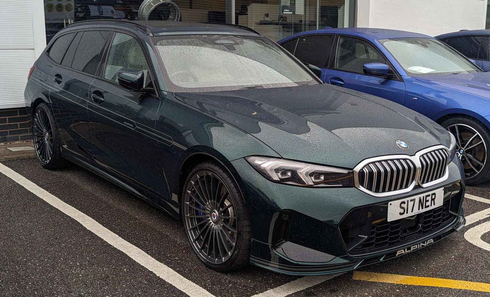 Sleek wagon with signature front grille and multi-spoke alloy wheels