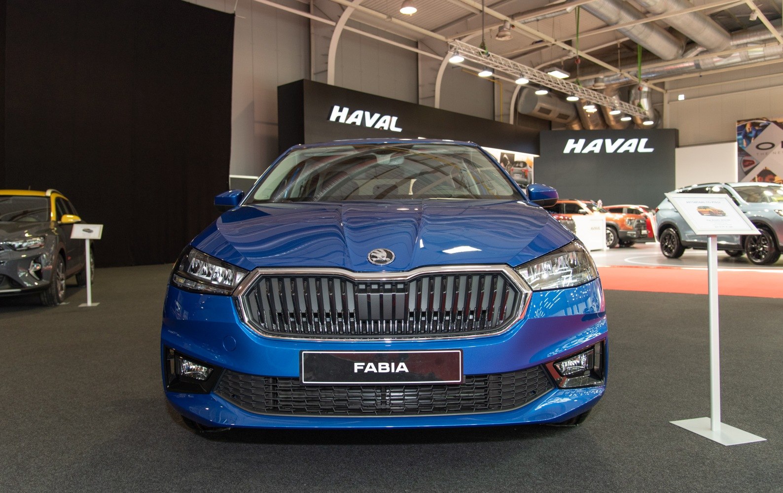 Close-up of front grille and headlights with a modern design.