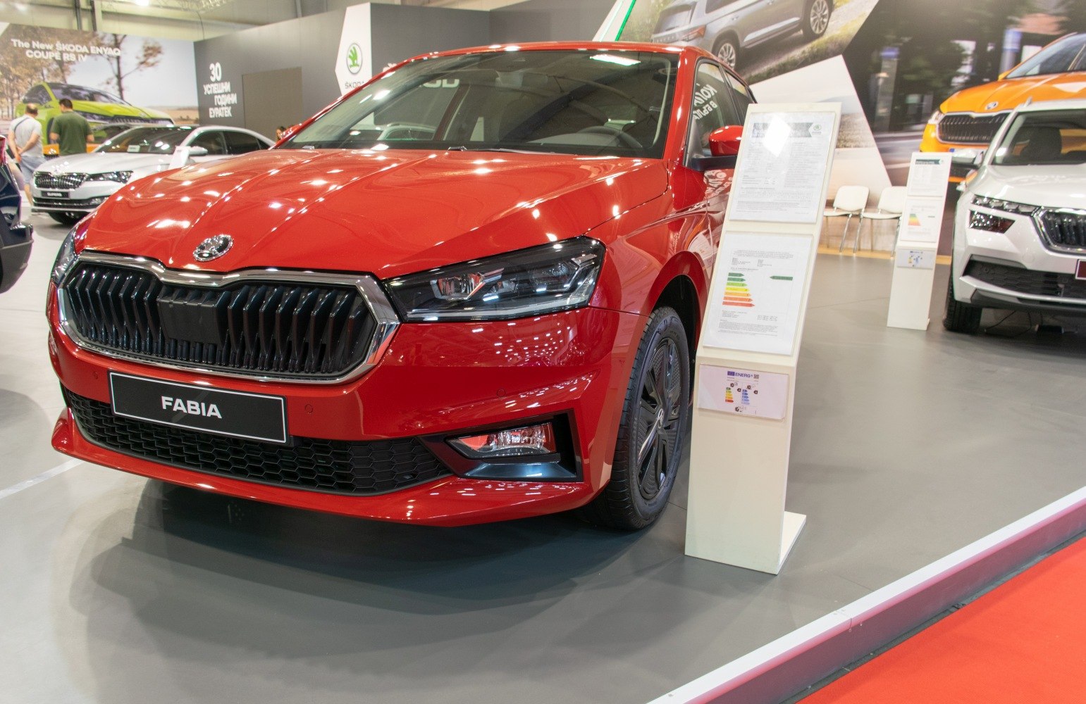 Front view of a car with black grille and sleek headlights