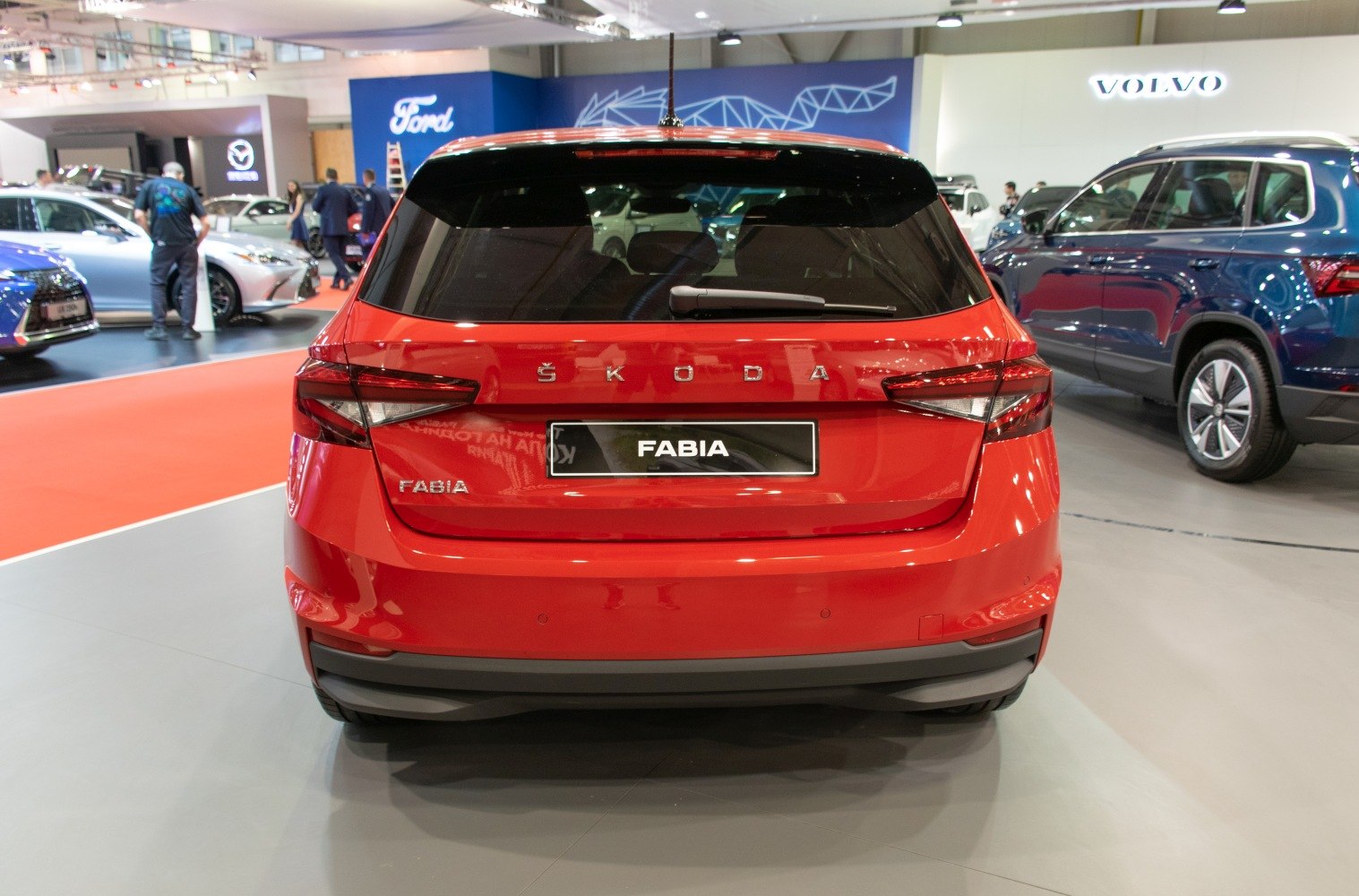 Rear view of a modern hatchback with sleek taillights and tinted rear window