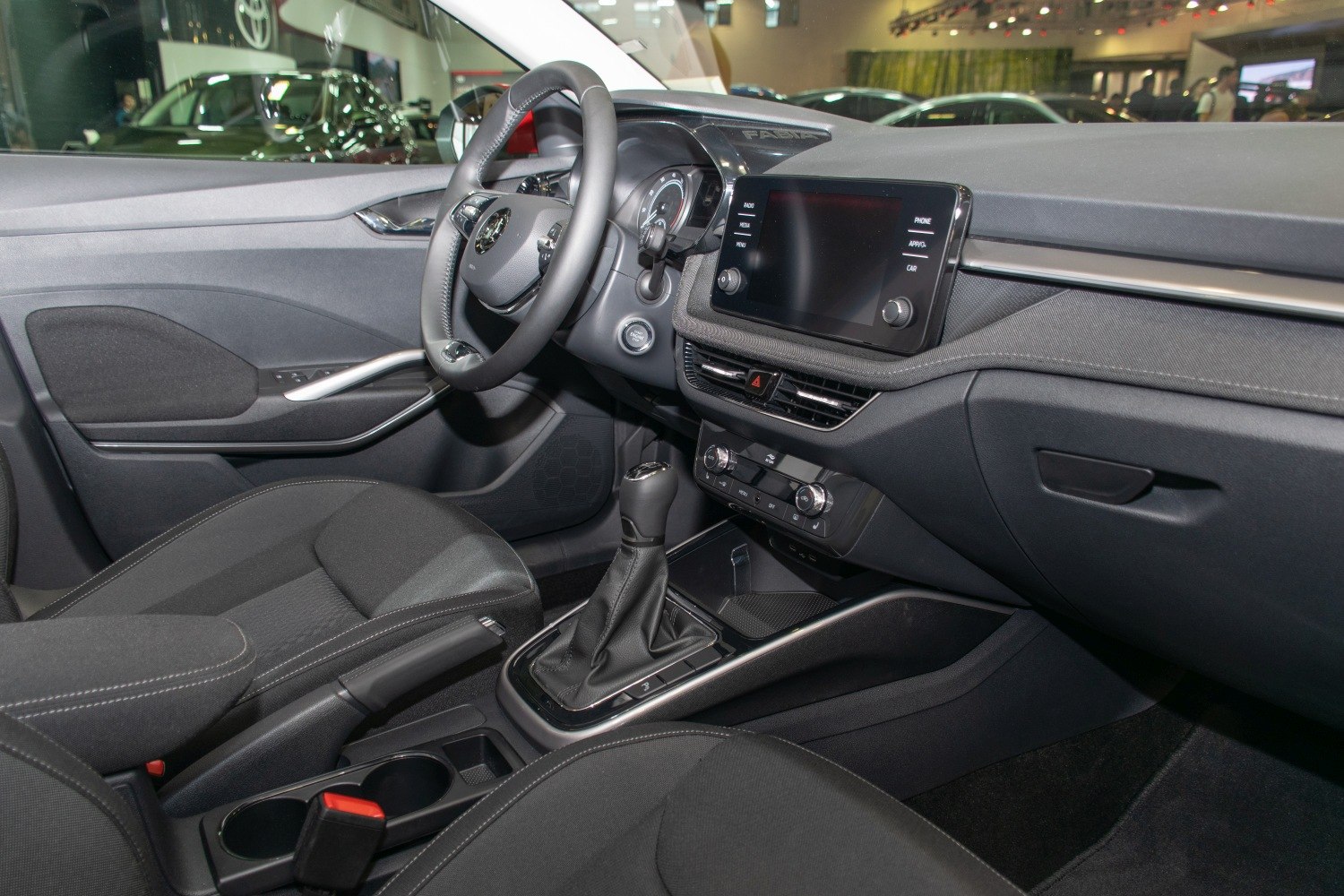 Dashboard, steering wheel, touchscreen, gear shifter, central console interior