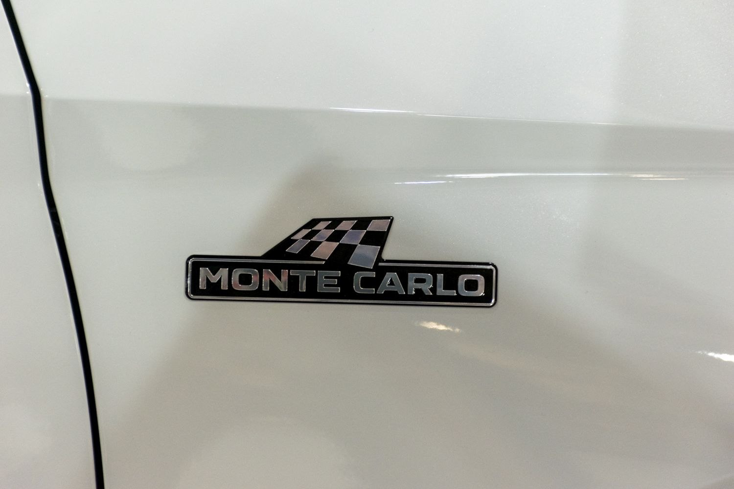 Monte Carlo side badge emblem with checkered flag design