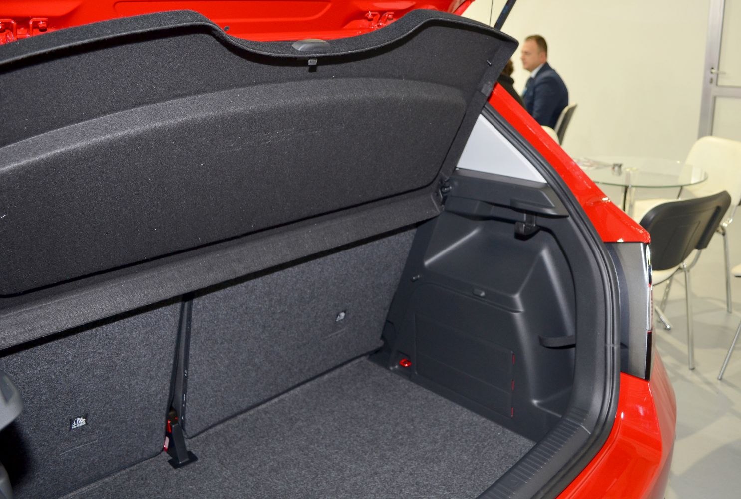 Hatchback trunk cargo space with foldable rear seat interior.