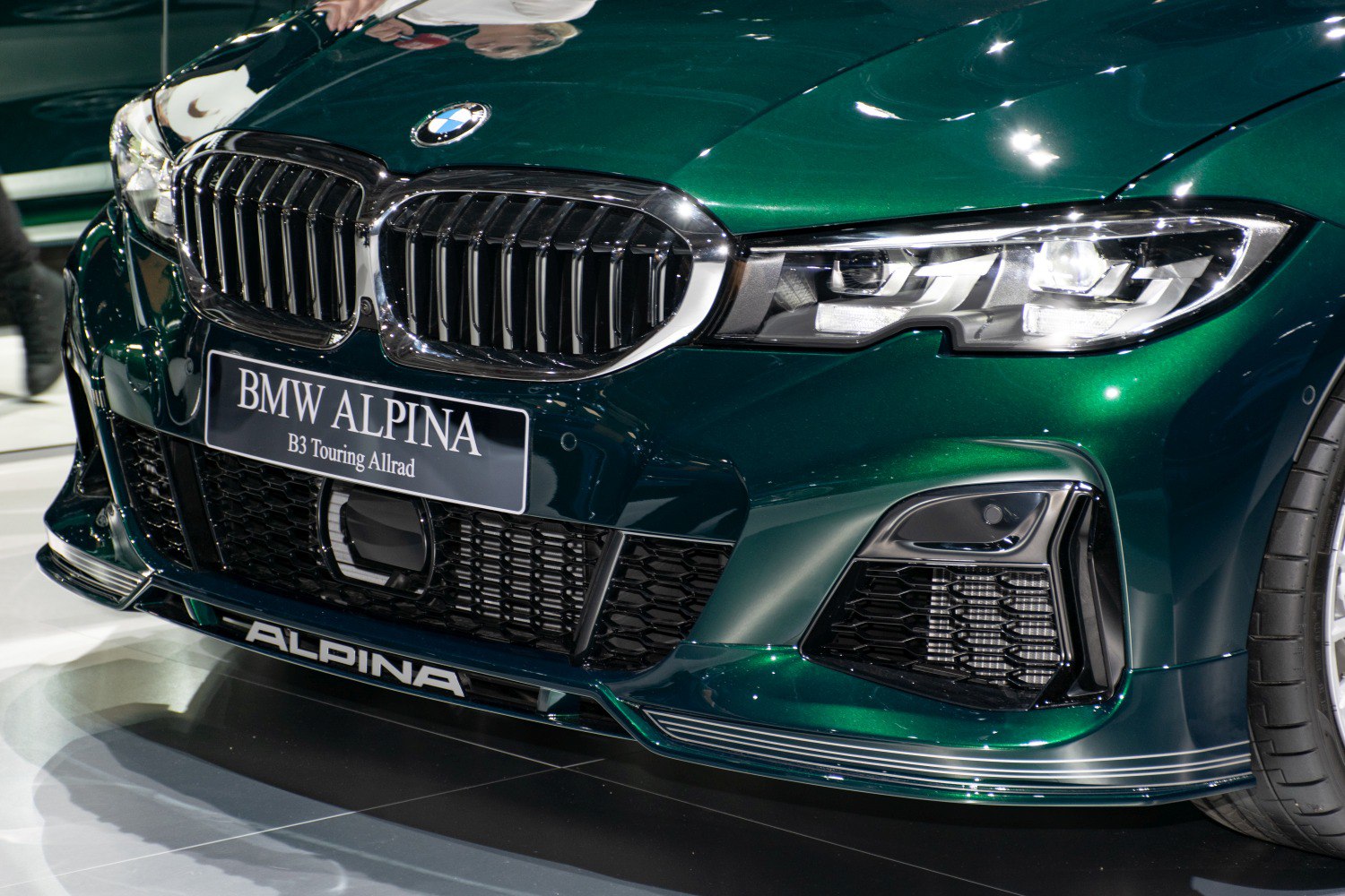 Close-up of kidney grille and headlight of a high-performance luxury wagon