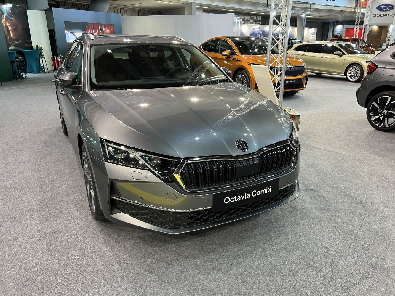 Front view with sleek LED headlights and bold black grille